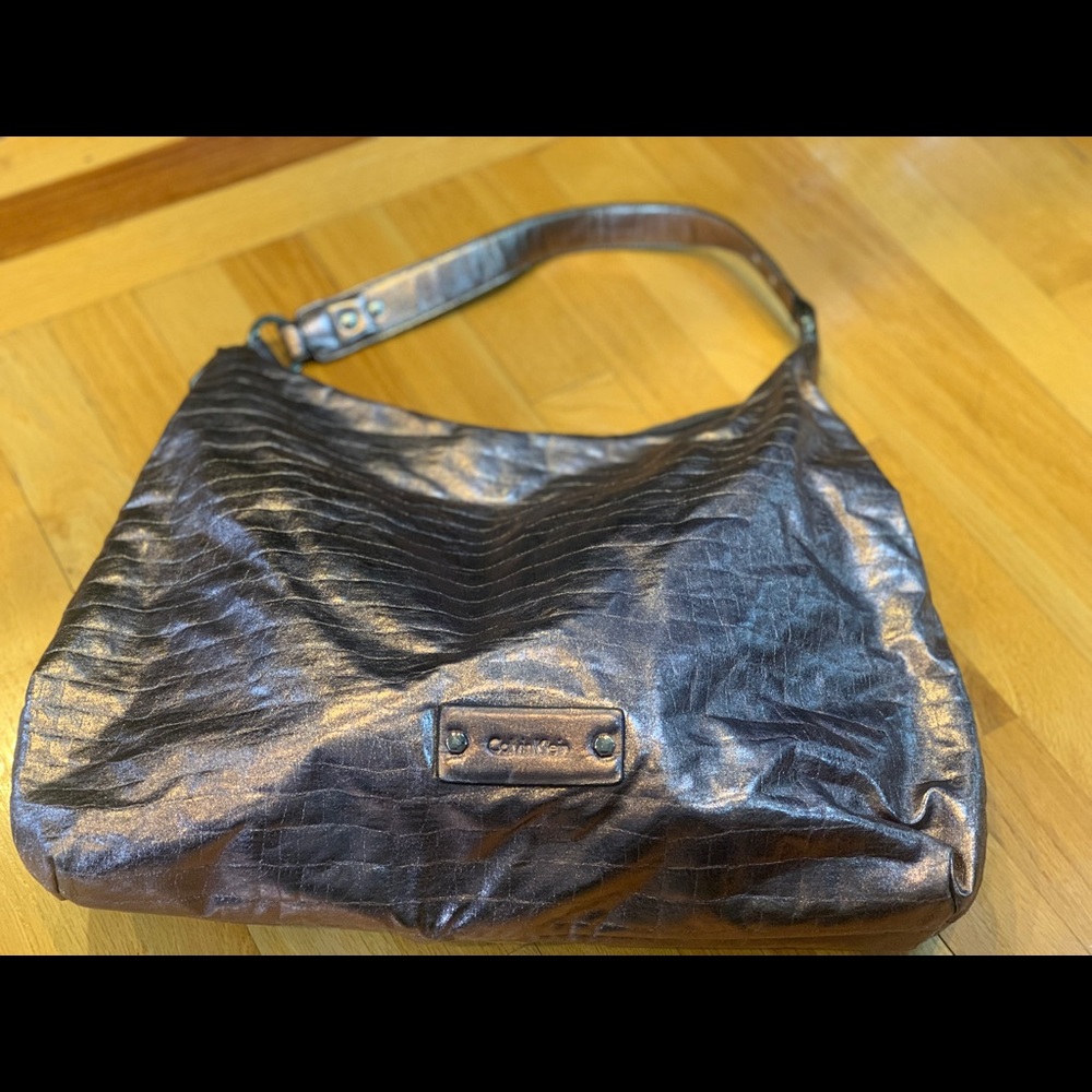 Calvin Klein metallic silver hobo bag.